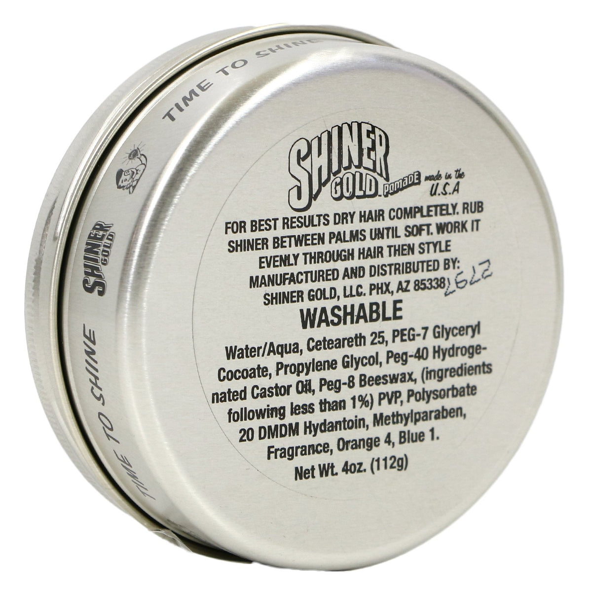 Hand holding Shiner Gold Pomade can to show size and travel-friendly 4 oz benefit