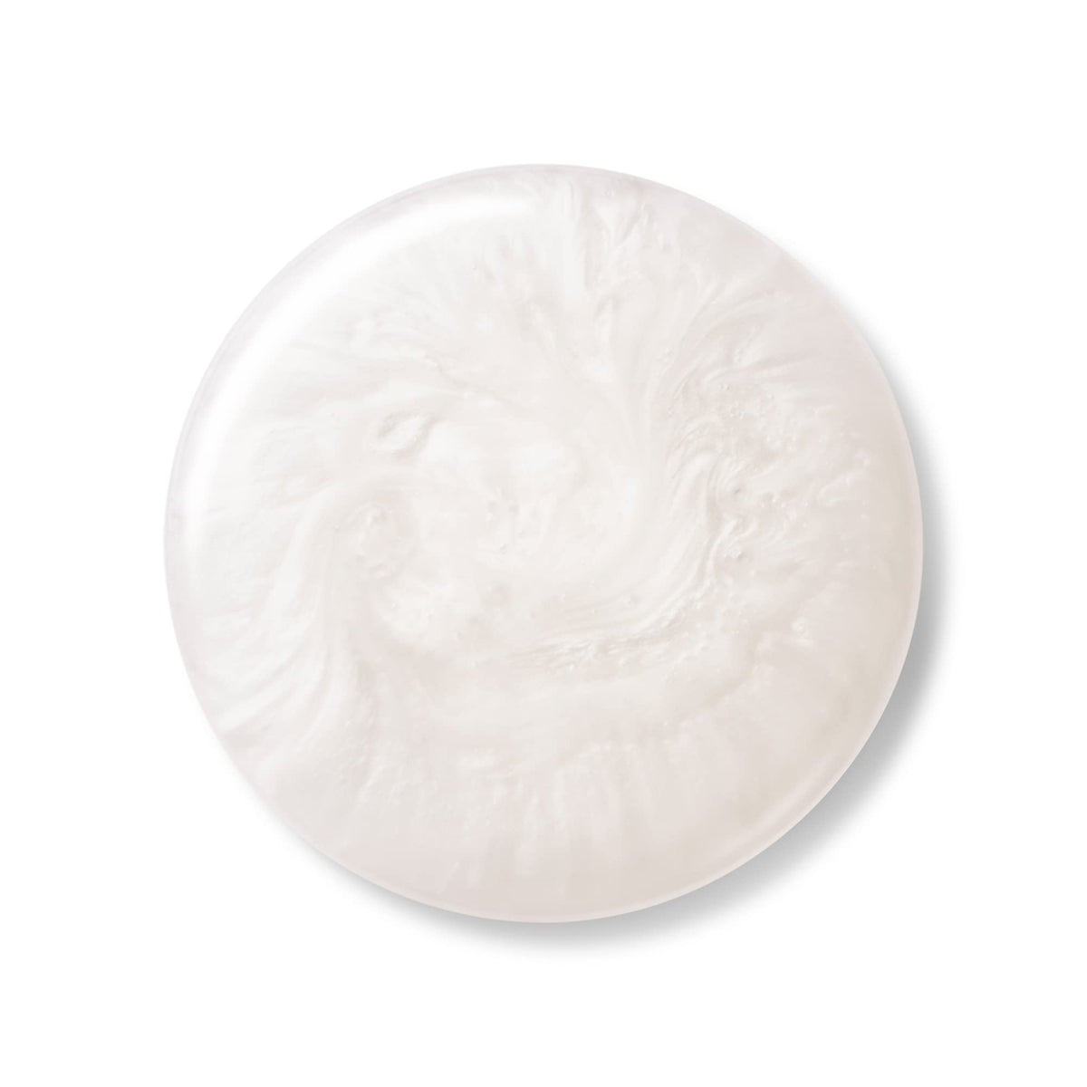 Shiseido cleansing milk dispensed on hand, creamy texture hydrates