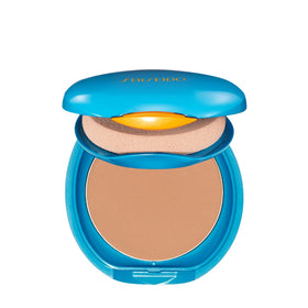 Shiseido compact refill in use with sponge for fast touch-up convenience