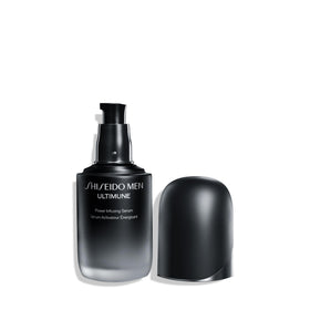 Shiseido bottle beside a coin for scale showing 50 mL travel-friendly benefit