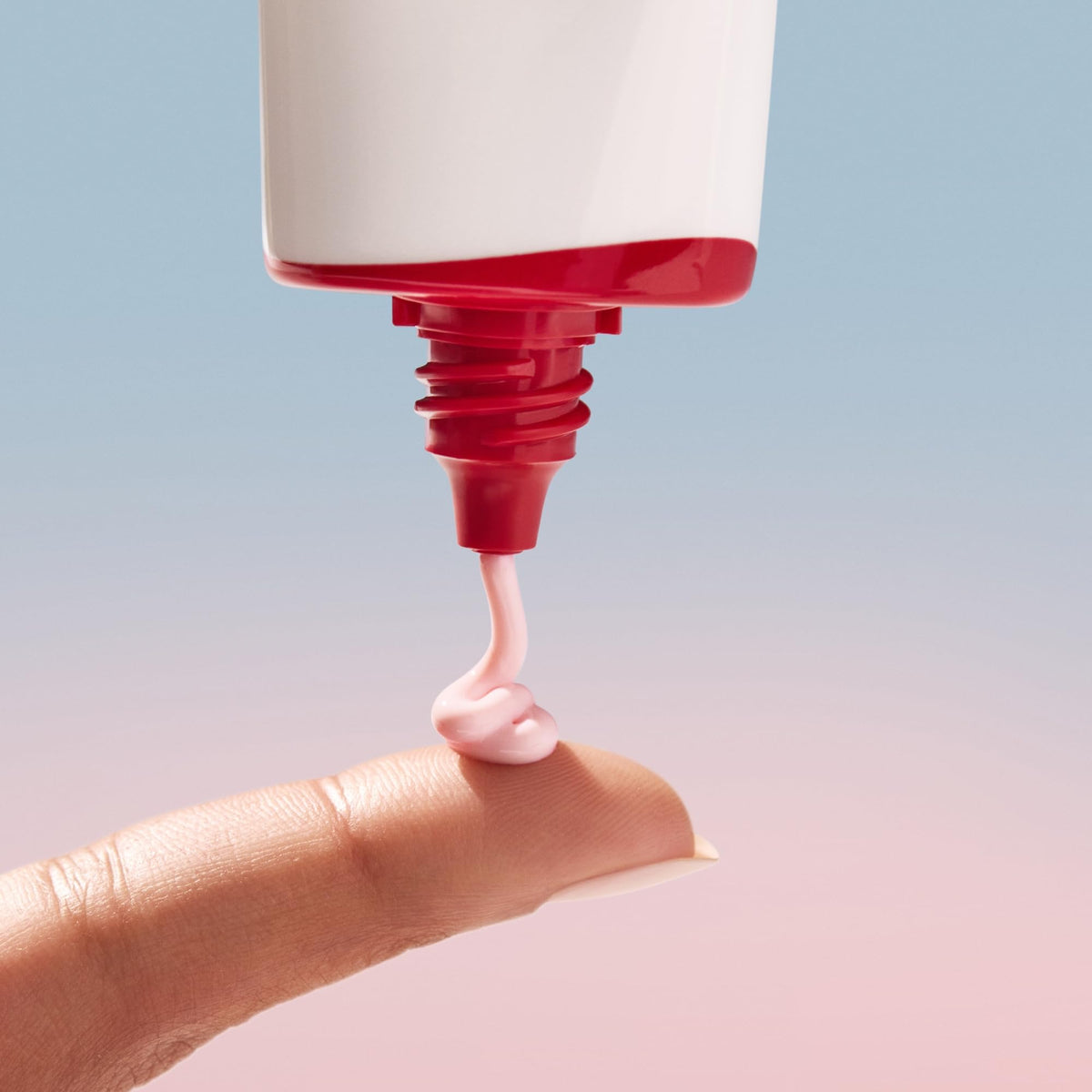 Shiseido RevitalEssence being applied with fingers for even coverage