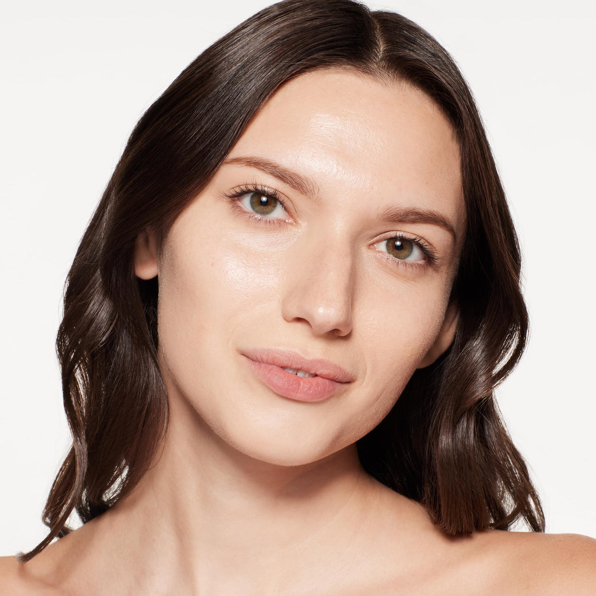 Shiseido application on skin illustrating even blend and luminous hydration