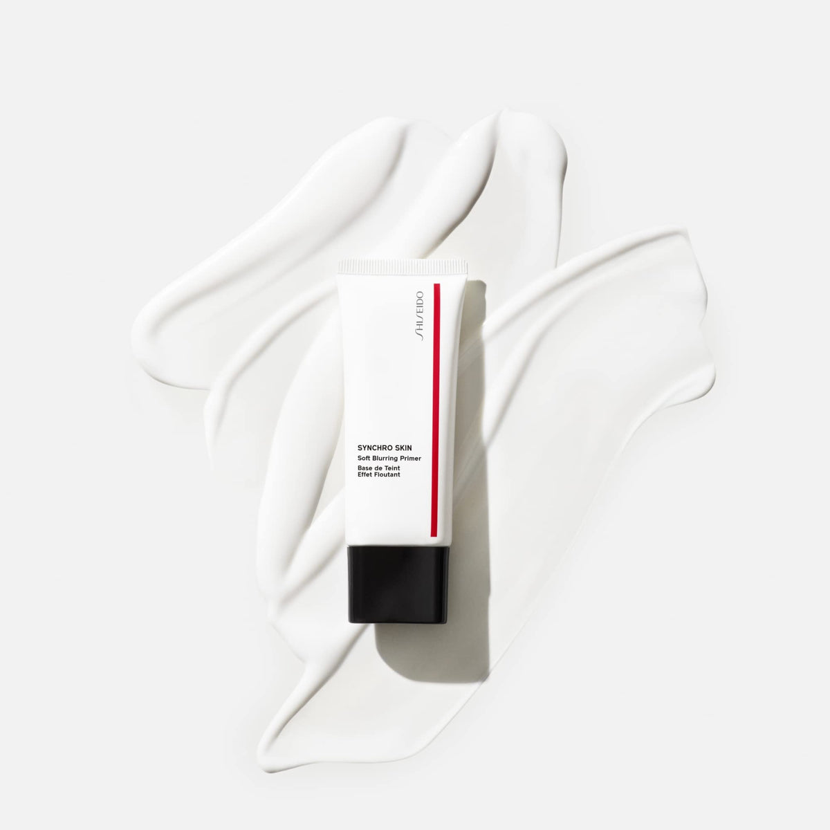 shiseido primer applied on T-zone with fingertip, controls shine benefit