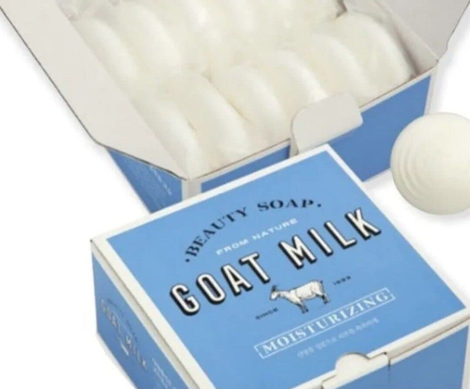 SHOWERMATE front packaging showing 12 white milk goat soap bars and durable box