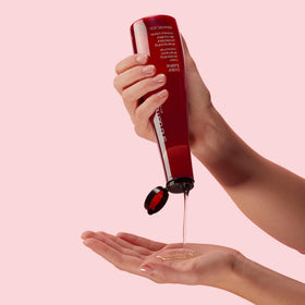 shu uemura art of hair bottle beside color-treated model for salon results