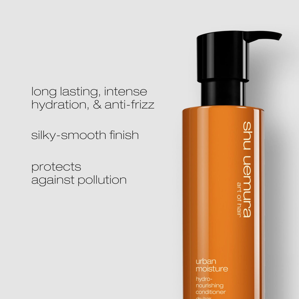 shu uemura held in hand to show 8 fl oz scale and easy handling