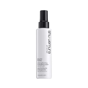 shu uemura art of hair bottle front packaging showing brand and product benefits