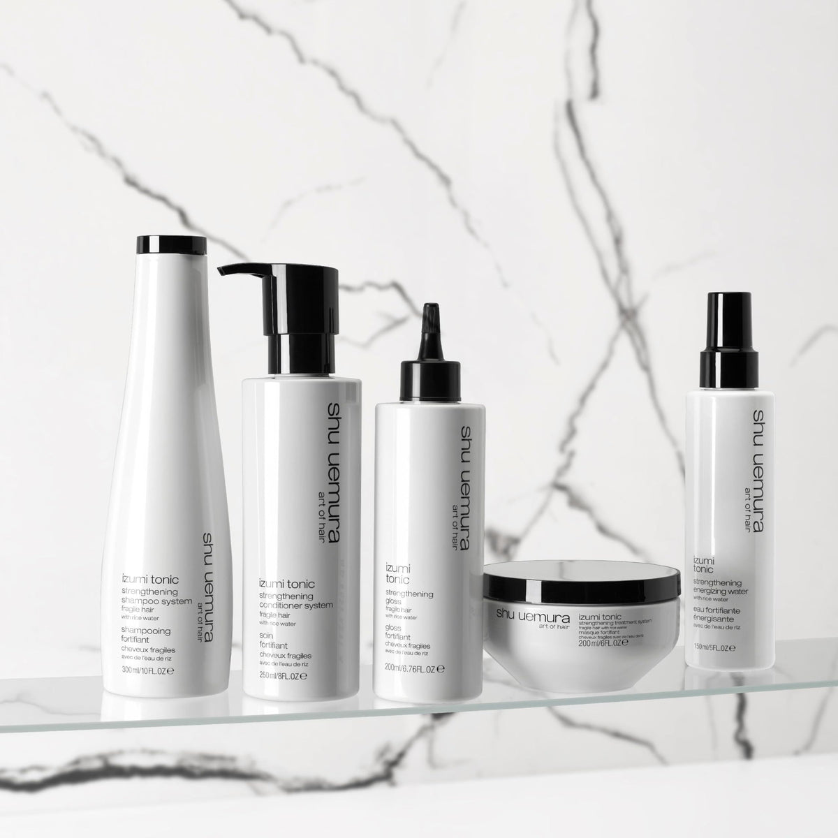 shu uemura art of hair product on bathroom shelf styling-ready for daily hydration