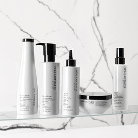 shu uemura art of hair product on bathroom shelf styling-ready for daily hydration