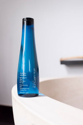 shu uemura product staged in bathroom showing lifestyle use and elegant scent