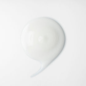 shu uemura art of hair product held in hand demonstrating 5 fl oz size