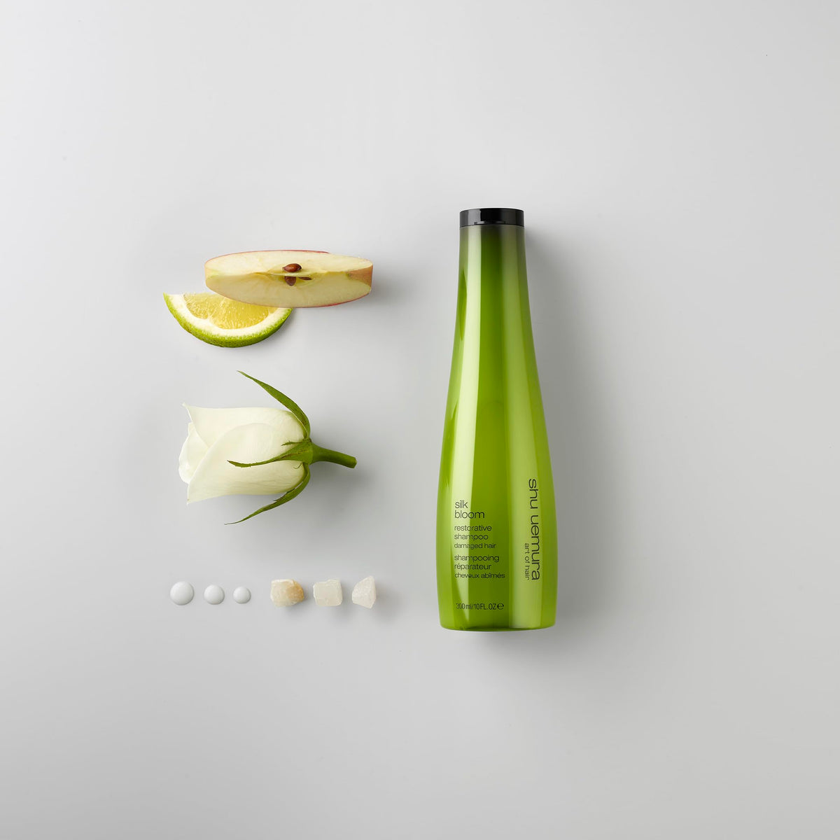 shu uemura art of hair pump and label detail highlighting ingredients and benefits