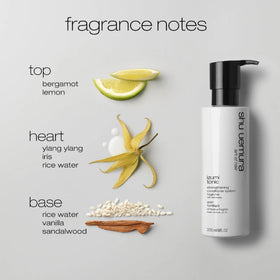 shu uemura 8 fl oz bottle next to ruler to convey true size and travel-friendly volume