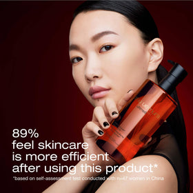 shu uemura oil drop on fingertip demonstrating silky texture and easy makeup removal