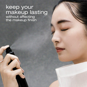 shu uemura visible spray droplet on skin texture highlighting hydrated finish