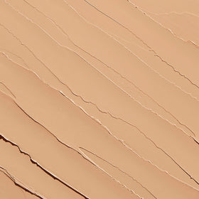 Sigma Beauty Ignite applied on eyelid showing improved eyeshadow adhesion