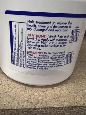 Silicon Mix shampoo and deep treatment in bathroom lifestyle scene showing simple at-home use