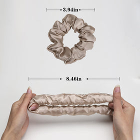 Silmer scrunchie on hand for scale, illustrating compact size and easy carry