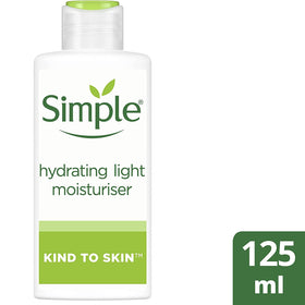 Simple moisturizer beside a coin illustrating 4.2 fl oz size and travel practicality