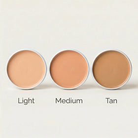 Simple Sophistication user at beach applying balm showing reef-safe outdoor protection