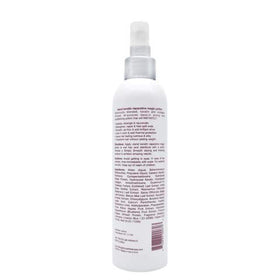 SIMPLY SMOOTH spray close-up mist texture demonstrating lightweight, even coverage
