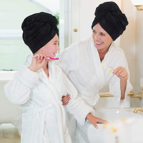 SINLAND turban on woman in bathroom demonstrating hands-free drying benefit
