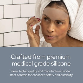 SiO BrowLift next to fingers showing compact size and travel-friendly benefit