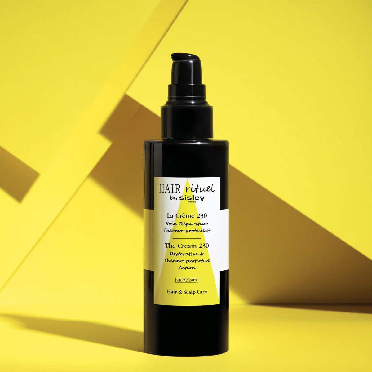Sisley Paris product in use during blow-dry delivering smooth, frizz-free hair