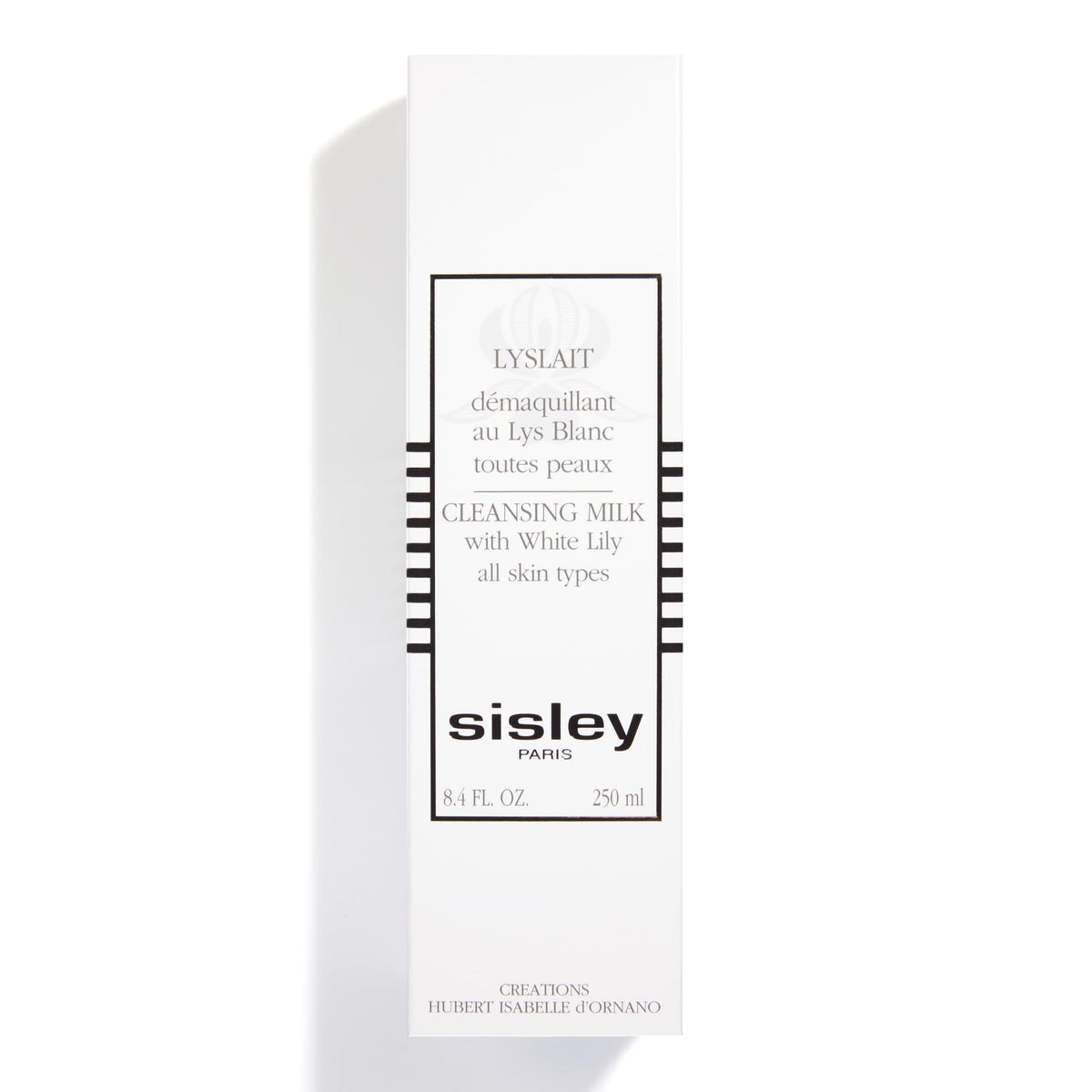 Sisley Paris Lyslait bottle beside common items to show 250 mL scale and travel convenience