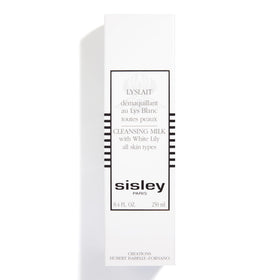Sisley Paris Lyslait bottle beside common items to show 250 mL scale and travel convenience