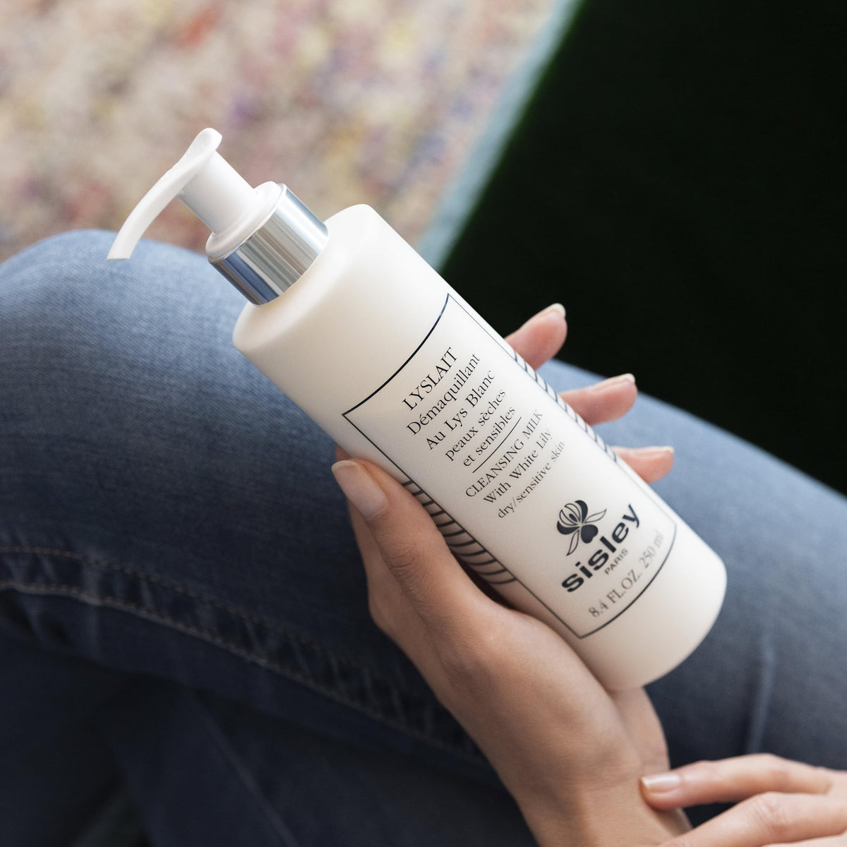 Sisley Paris Lyslait in-hand during makeup removal demonstrating gentle, effective cleansing