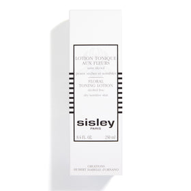 Sisley Paris bottle next to everyday items showing 250 mL scale