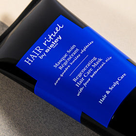 Sisley Paris mask applied during scalp massage, demonstrates nourishment and stimulation