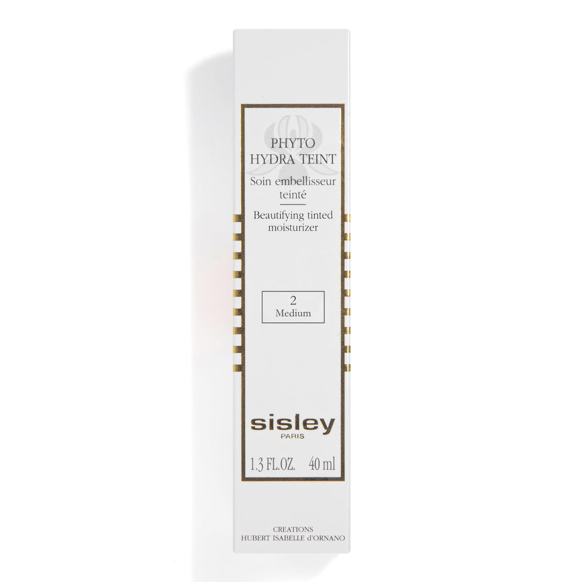 Sisley Paris product next to coin for scale illustrating 40 mL travel-friendly size