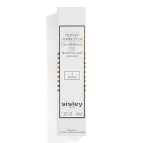 Sisley Paris product next to coin for scale illustrating 40 mL travel-friendly size