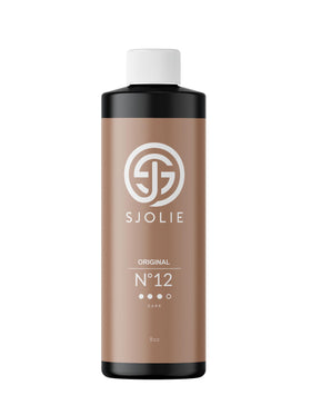 SJOLIE SUNLESS front bottle showing label and dark tan promise