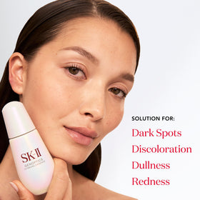 SK-II dropper dispensing serum showing silky texture and quick absorption benefit
