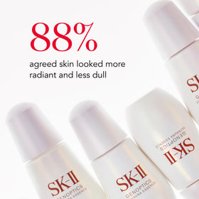 SK-II bottle in hand demonstrating 1.7 oz scale and travel-ready convenience