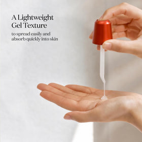 Applying SK-II essence on hand demonstrating quick absorption and hydration benefit