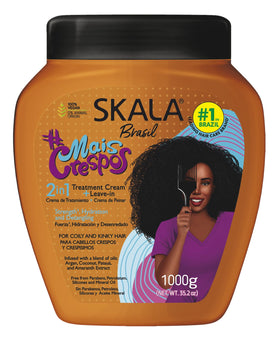 Applying SKALA cream on hand for easy detangling and softness