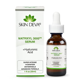 SKIN DEVA bottle next to nightstand items, suggests evening routine hydration and firmness