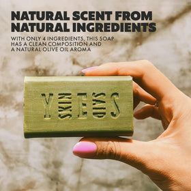Skin Said Yes soap bar beside ruler demonstrating size and long-lasting value
