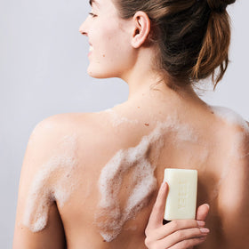 Skin Said Yes olive oil and shea butter still life showing nourishing natural ingredients