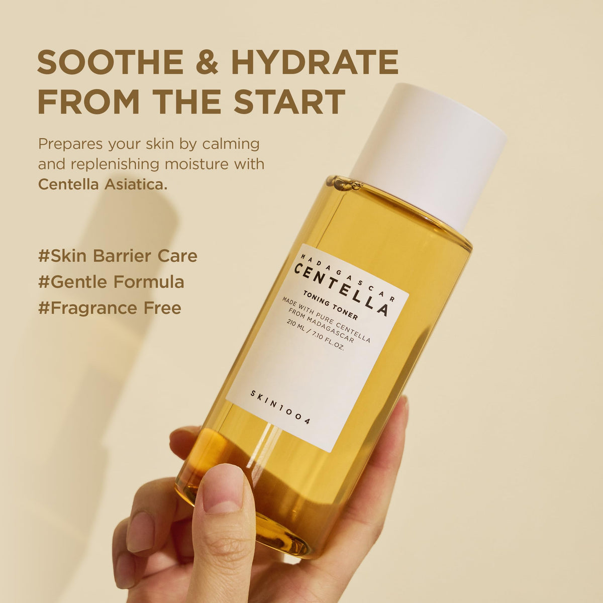 SKIN1004 pouring watery essence to show lightweight texture and absorbency