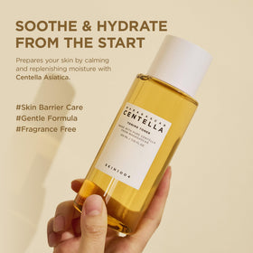 SKIN1004 pouring watery essence to show lightweight texture and absorbency