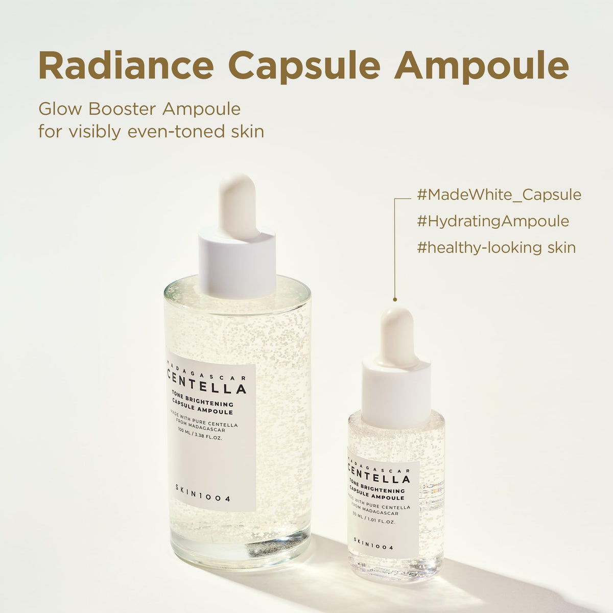 SKIN1004 travel-size bottles in hand showing compact convenience