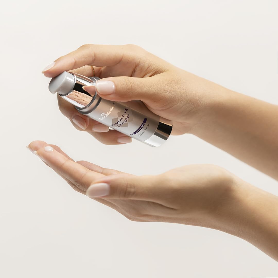 SkinMedica serum beside sunscreen in morning routine scene, emphasizes daytime antioxidant support