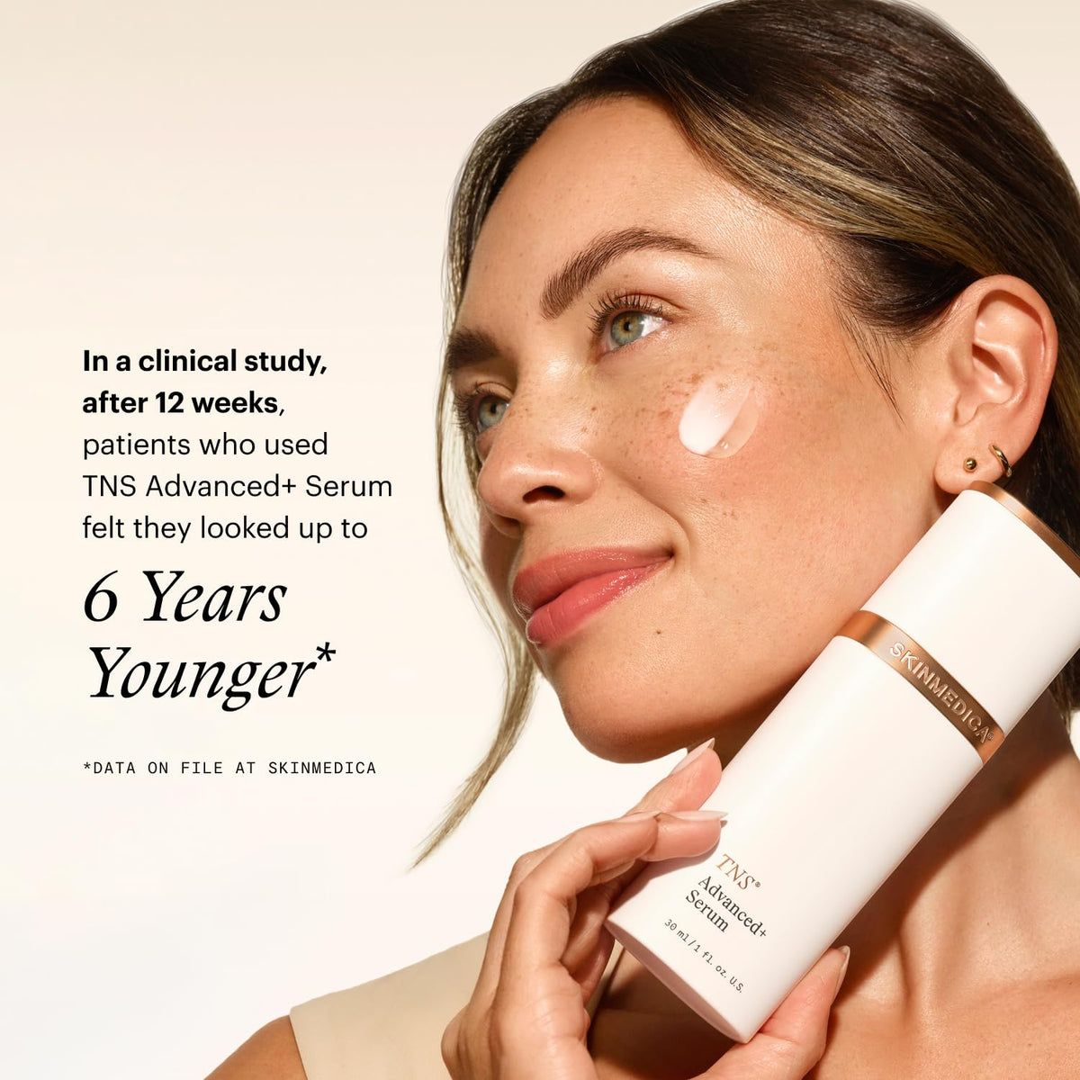 SkinMedica bottle beside a hand for scale to show one-ounce size and travel-friendly benefit