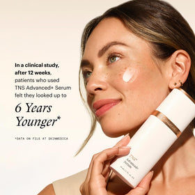SkinMedica bottle beside a hand for scale to show one-ounce size and travel-friendly benefit