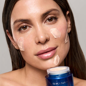 SKINN product being applied on hand demonstrating smooth spread